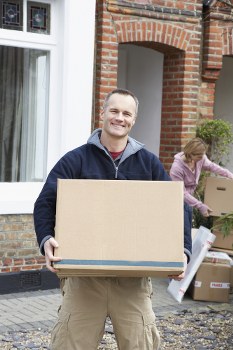 Team preparing items safely for a van move