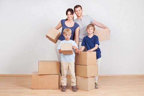 Professional packing service organising fragile household items in Addington