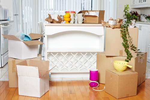 Moving team organising boxes and furniture for transport