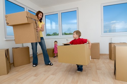 Packed moving boxes and furniture ready for unloading at a new home