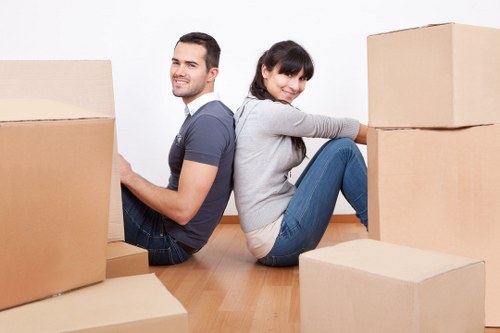 Household furniture being moved from a flat in Addington
